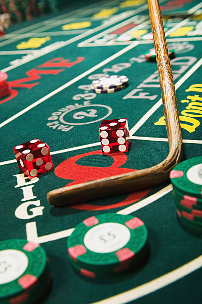Live blackjack table with dealer and multiple players visible on screen